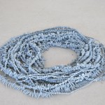 Chiara Camoni, Sul perché in natura tutto avvolge a sinistra, 2012, terracotta azzurra, filo di ferro, 50x60 cm