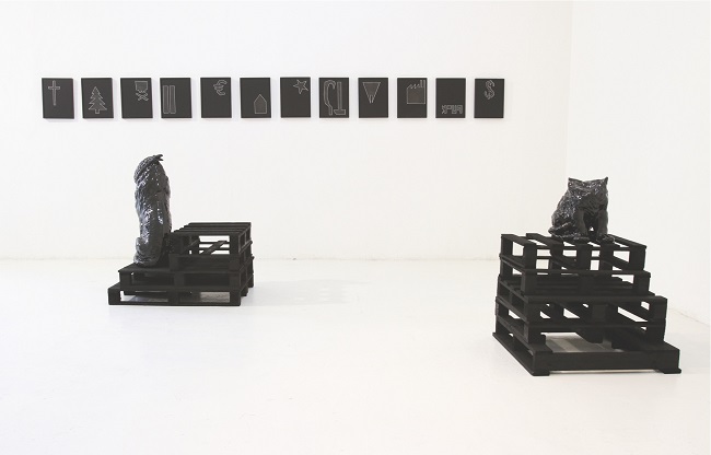 Nero (Alessandro Neretti), I nuovi apostoli ovvero Paesaggi economico-strutturali, 2012, terracotta smaltata, gres porcellanato, passepartout sagomati, legno, vernice nera, h194x810x392 cm